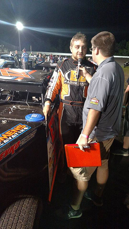 Jacob Bleess is interviewed by USMTS announcer Bryce Hall prior to the main event during the 10th Annual “Taste the Feeling” Classic presented by Coca-Cola Bottling Company of Winona at the Mississippi Thunder Speedway in Fountain City, Wis., on Friday, May 26, 2017.