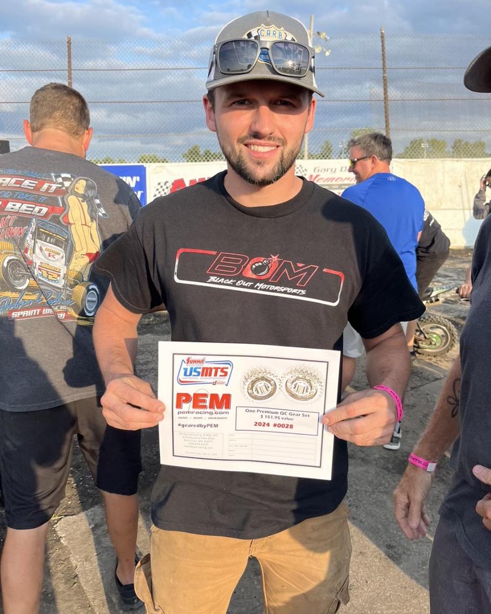 Gunner Martin picked up a new gear set courtesy of PEM Racing Gears & Drivetrain at the drivers meeting during the 7th Annual USMTS Grant Junghans Memorial featuring the Summit USMTS National Championship presented by RacinDirt at the Lakeside Speedway in Kansas City, Kan, on Thursday, Aug. 8, 2024.