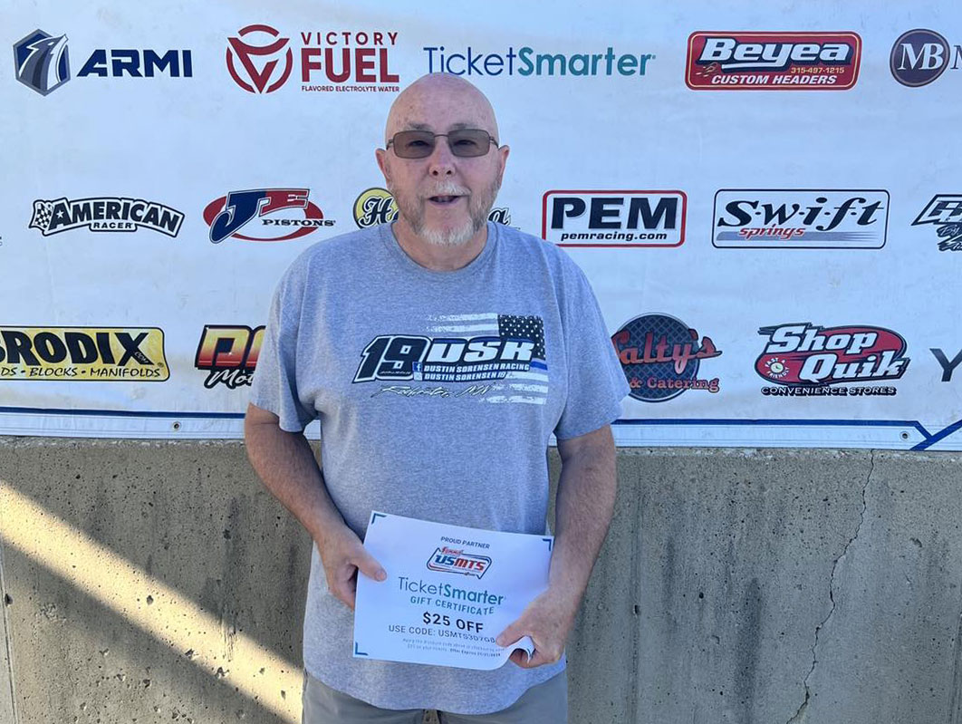Ron from Minnesota is our TicketSmarter #1 fan of the night at the Fall Jamboree at the Deer Creek Speedway. Ron is wearing a shirt supporting Dustin Sorensen.